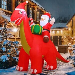 Inflatable Red Dinosaur with Santa Claus